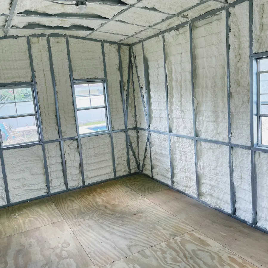 Closed-cell spray foam insulation applied to wall cavities in a residential project in Takoma Park
